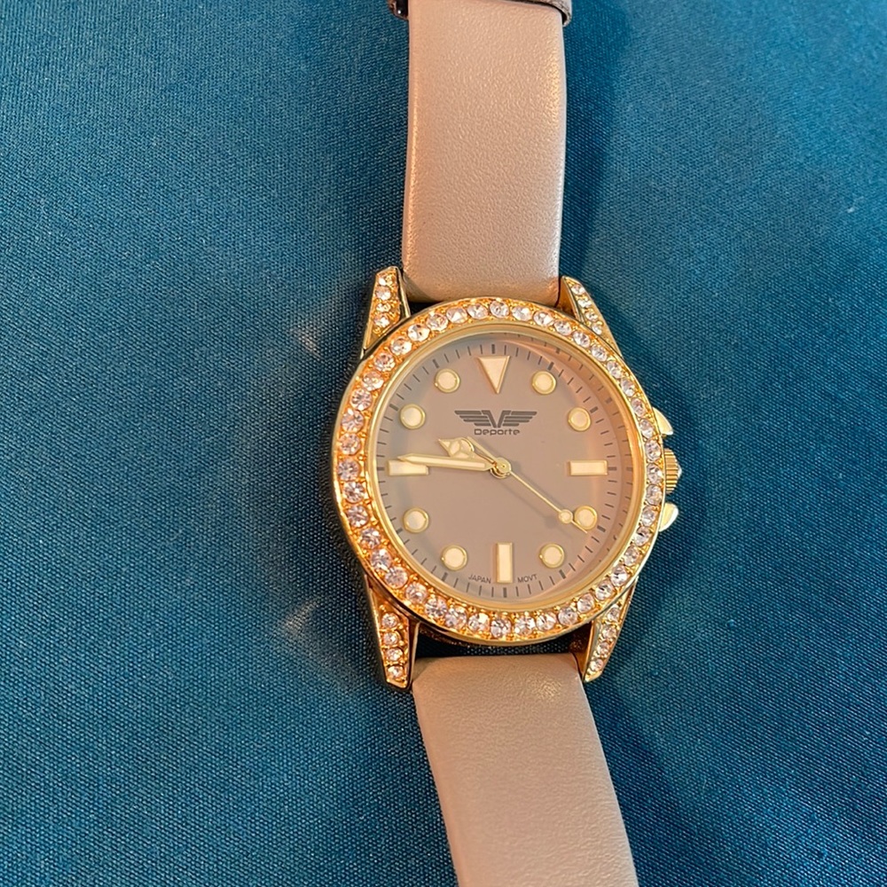 Gray and jeweled ladies wrist watch